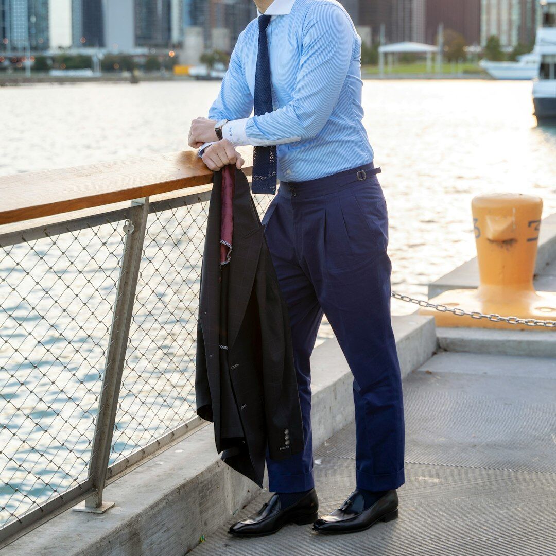 Professional male business trainer in a suit with confident posture
